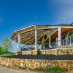 Exterior, pavilion addition, Stonewall Golf Club. Photo by John Magor for James Hricko Architect LLC.